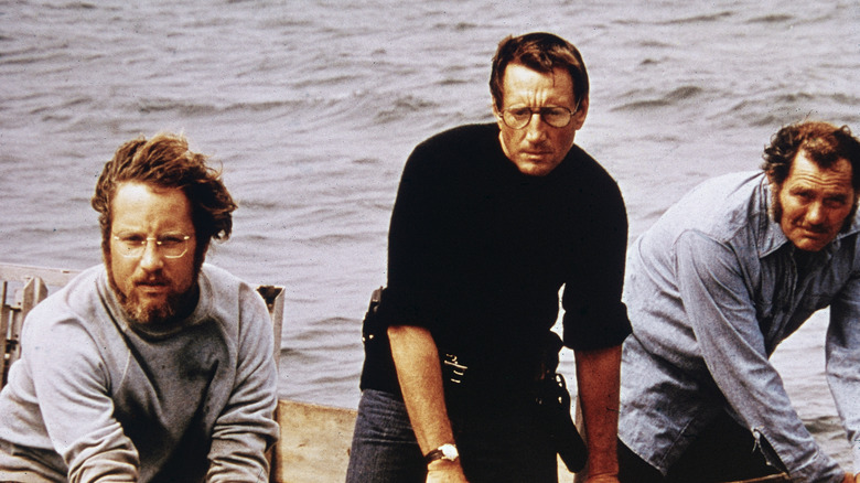 Hooper, Brody, and Quint hunt for a shark in "Jaws" (1975)