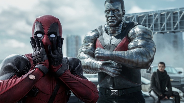 A shocked Deadpool standing near Colossus and Negasonic Teenage Warhead in "Deadpool"