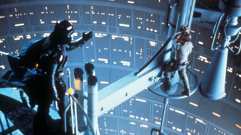 Darth Vader gesturing to Luke Skywalker in "Star Wars: Episode V - The Empire Strikes Back"