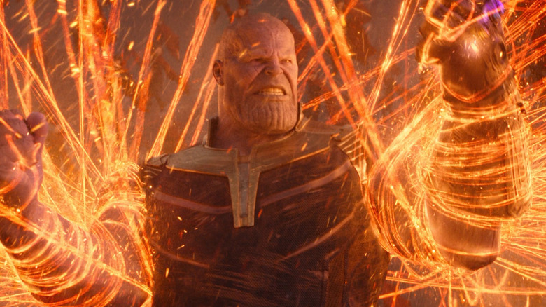 An angry Thanos bound by thousands of magical threads