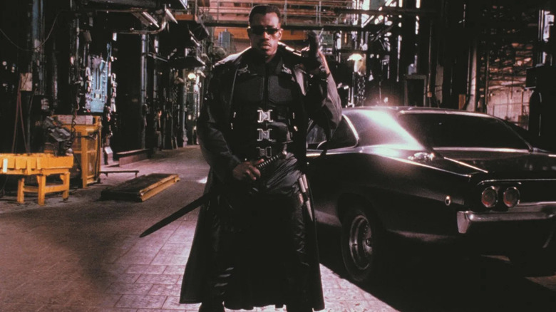 Blade standing in front of car