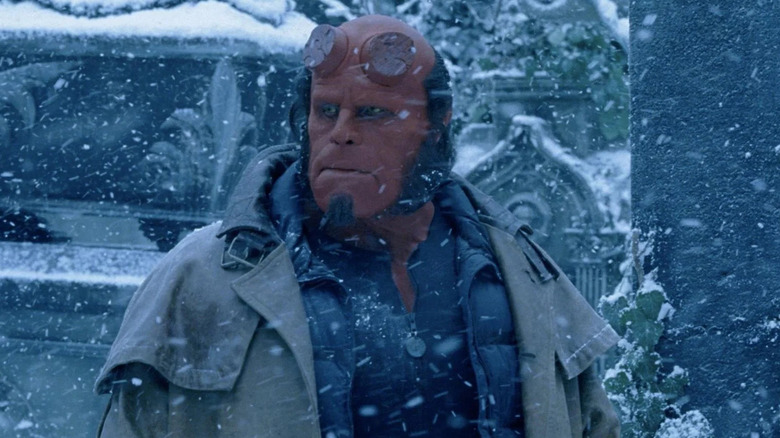 Hellboy standing in the snow