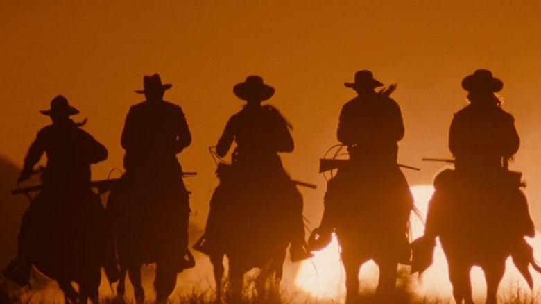 The cowboys of Tombstone riding their horses in Tombstone