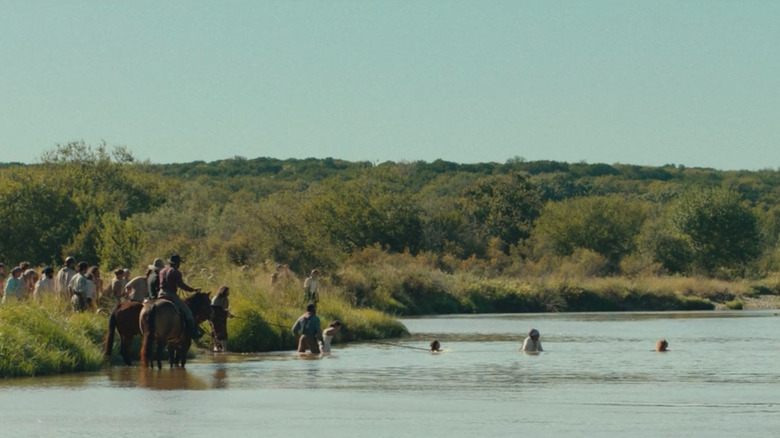 The group crosses a river