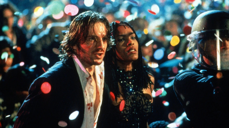 Lenny and Mace at New Year's celebrations in "Strange Days" (1995)