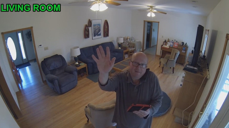 Riley setting up security cameras