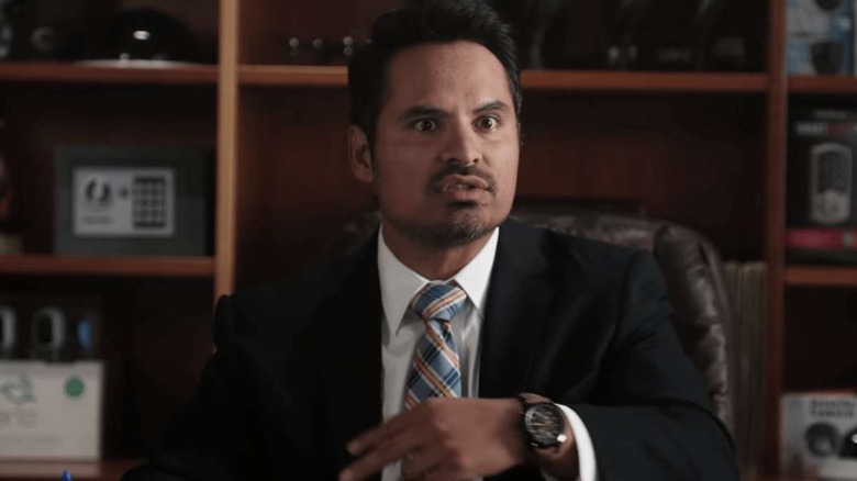 Luis wearing suit