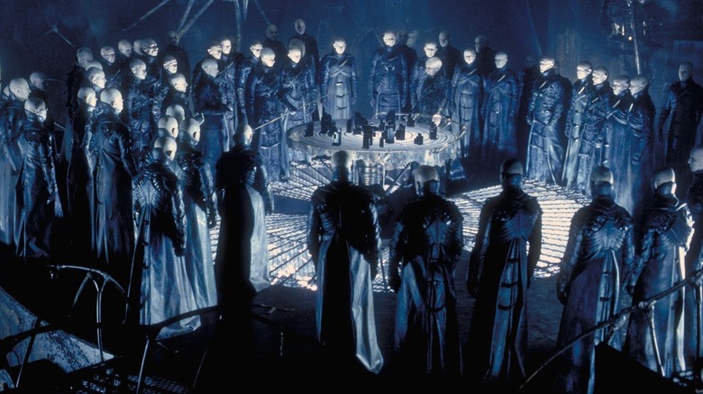 The Strangers gathered together in "Dark City"