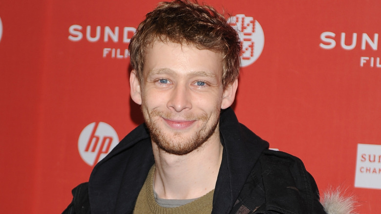 Johnny Lewis smiling at 
