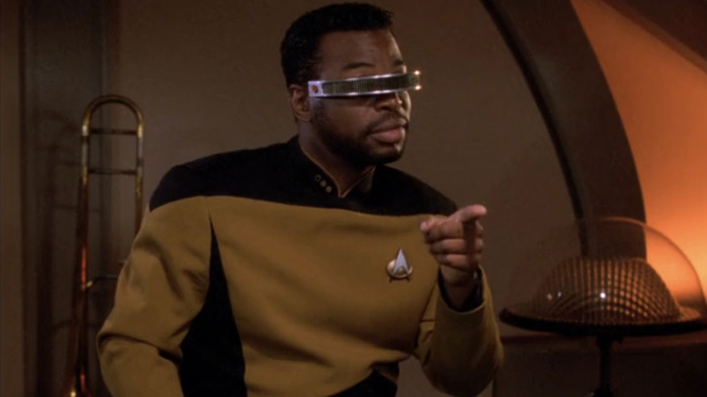 Georid points at Riker in Star Trek: The Next Generation