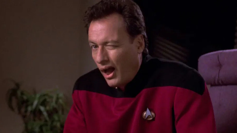 Q winks in Star Trek: The Next Generation