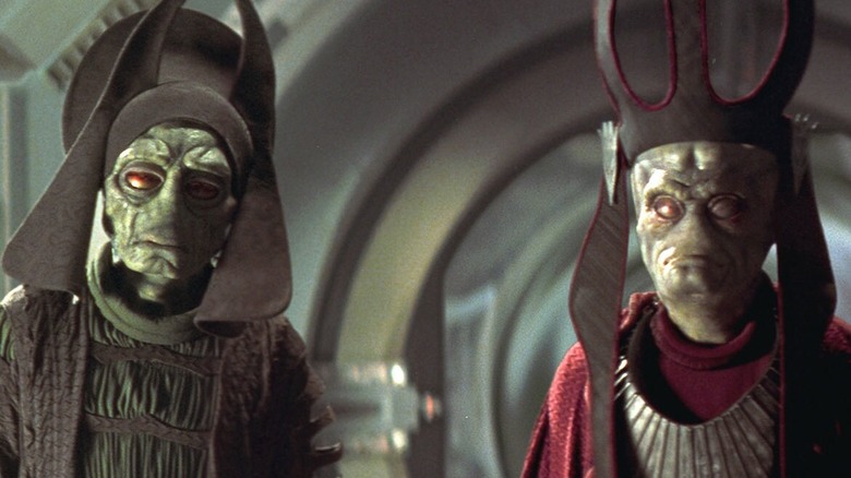 Two Neimoidians look concerned in Star Wars Episode I: The Phantom Menace