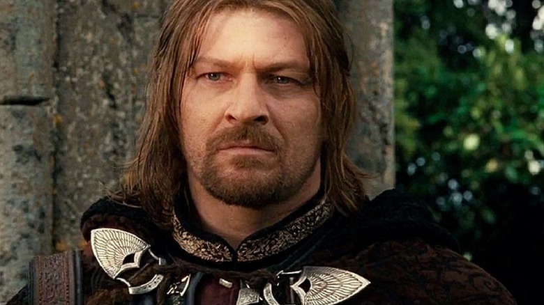 Boromir lays dying below Aragorn