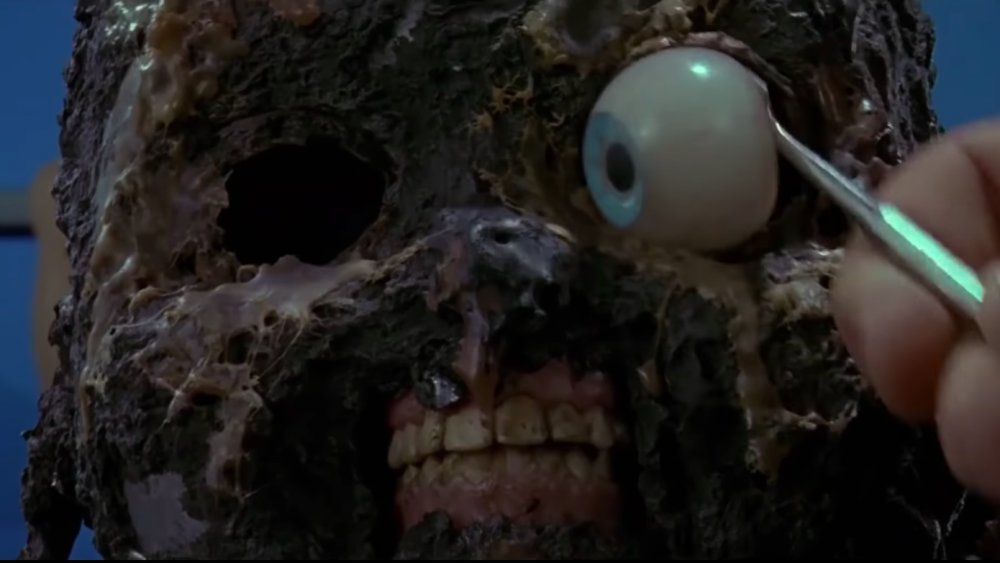 A mangled and burned Chucky from Child's Play