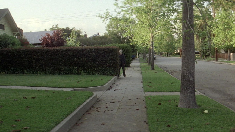 Michael Myers peeking behind bush