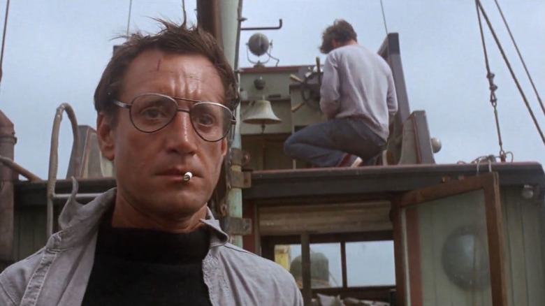 Brody smoking on boat