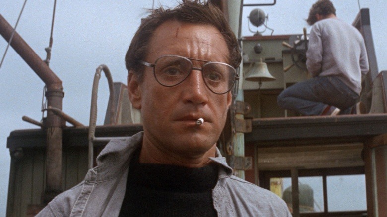 Chief Brody on boat with cigarette in mouth