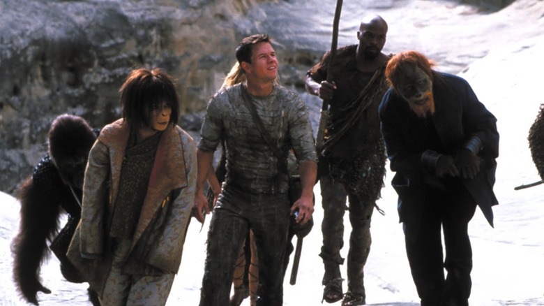 Ari, Davidson, and Limbo trek across wilderness in "Planet of the Apes" (2001)