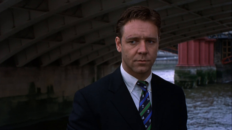 Thorne stands under bridge