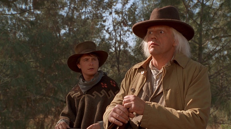 Marty and Doc wearing cowboy clothes