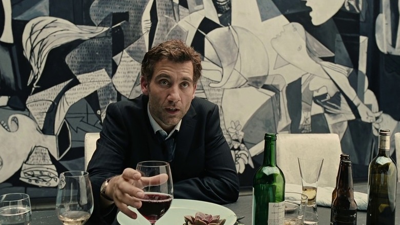 Theo Faron holding wine