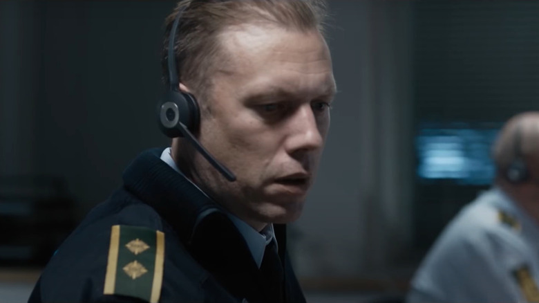 Asger Holm answering a call