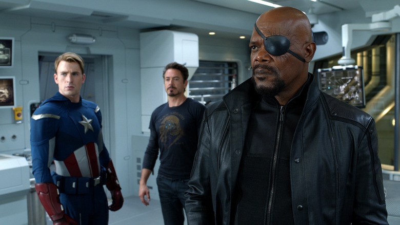 Steve Rogers, Tony Stark, and Nick Fury in an argument in The Avengers (2012)