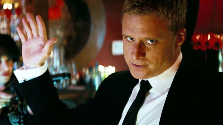 Dutch holds up his hands in surrender in "Transformers: Dark of the Moon" (2011)