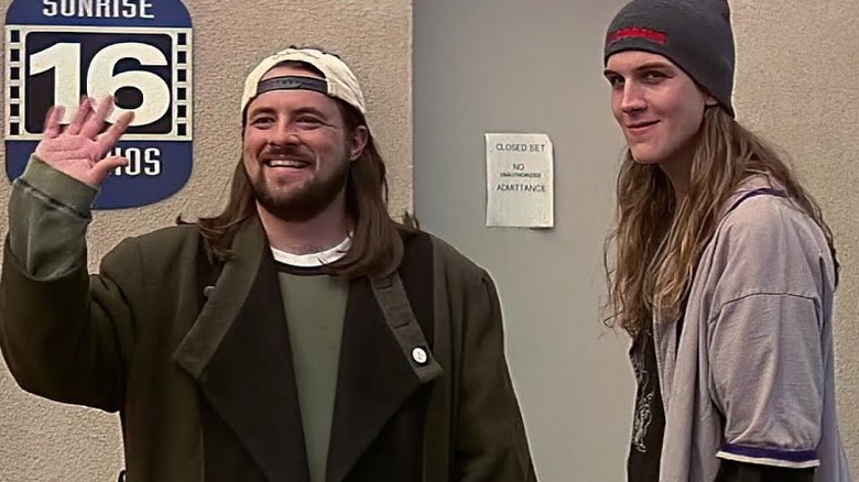 Jay and Silent Bob wave outside a studio lot door in "Scream 3" (2000)