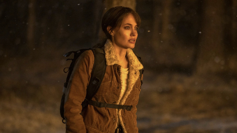 Hannah in the woods during a wildfire in "Those Who Wish Me Dead" (2021)