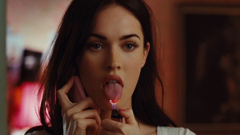 Jennifer sticks her tongue on a lighter in "Jennifer's Body" (2009)
