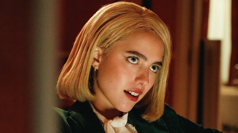 Rebecca looks up seductively in "Sanctuary" (2022)