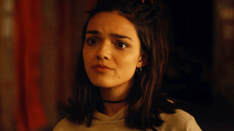 Laura looks worried in "Y2K" (2024)