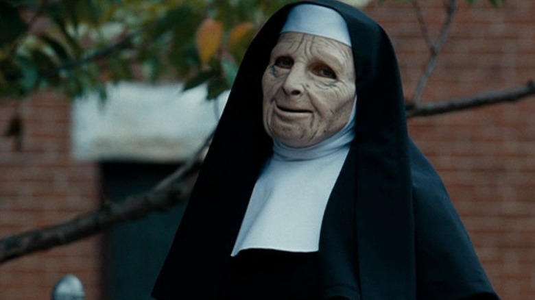 A robber dressed as a nun in "The Town" (2010)