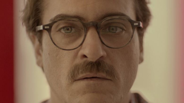 Joaquin Phoenix close-up in glasses