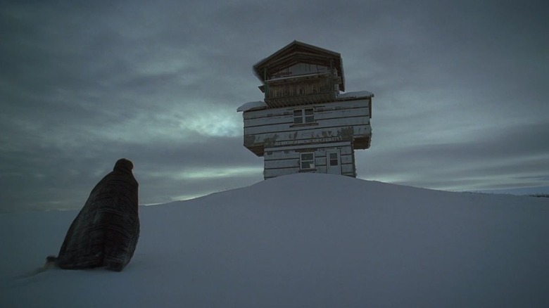 Riley Keough walks toward house