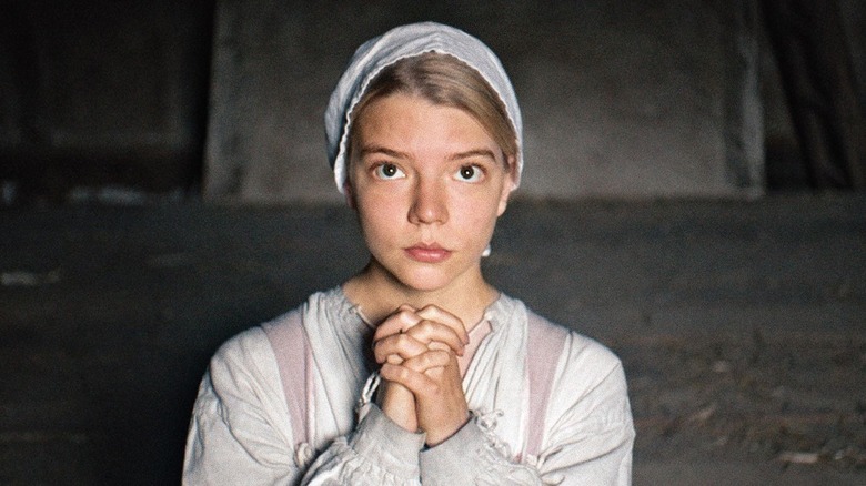 Anya Taylor-Joy's Thomasin prays