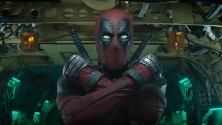 Deadpool forming the X of X-Force