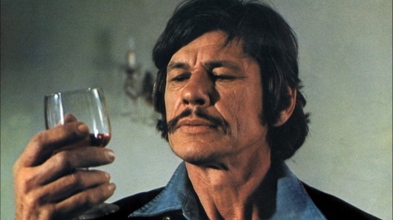 Charles Bronson enjoys fine bordeaux