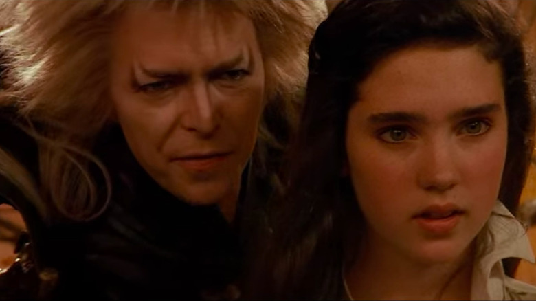 Sarah and the Goblin King look toward the distant Labyrinth