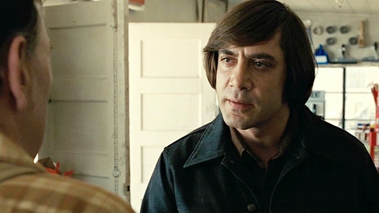 Chigurh at a gas station talking to the clerk in No Country for Old Men