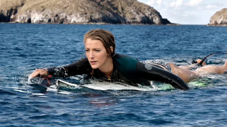 Nancy swimming out on her surfboard in The Shallows