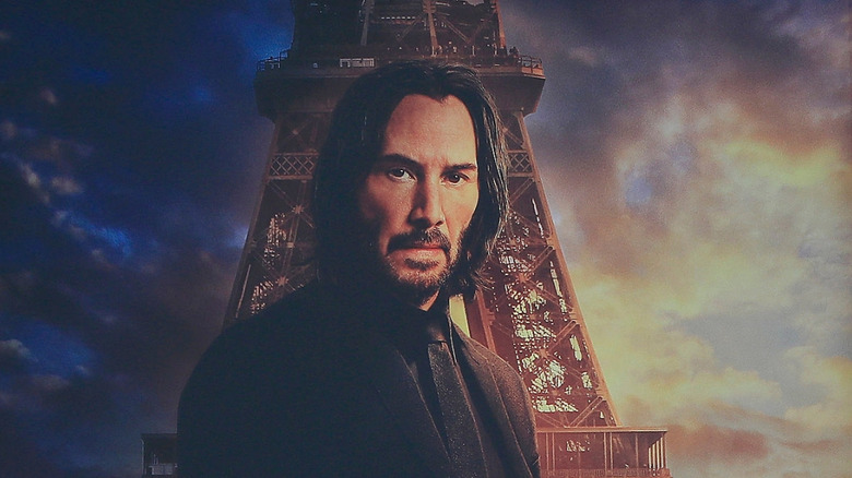 John Wick in front of the Eiffel Tower