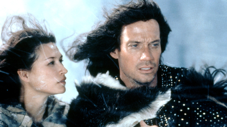 Kull and Zareta standing outside in cold weather in Kull the Conqueror