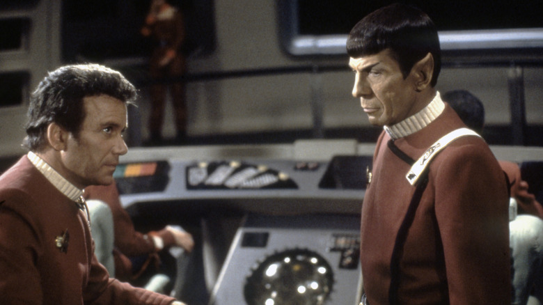 Kirk and Spock facing each other in contemplation in Star Trek II: The Wrath of Khan (1982)
