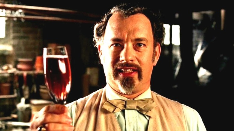 Goldthwaite holding wine glass