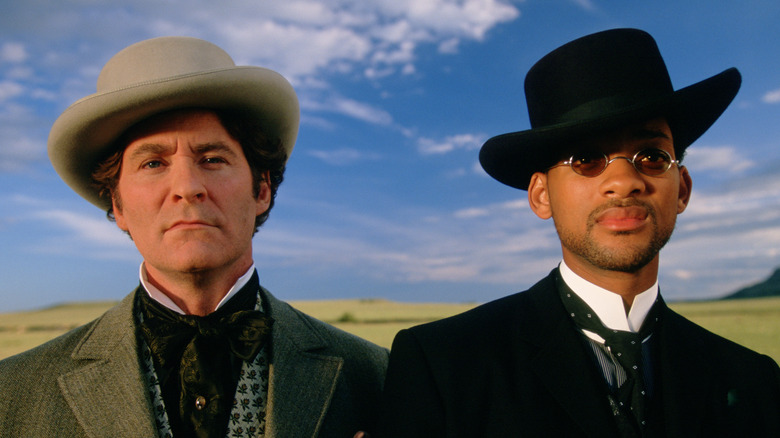 West and Grant standing outside