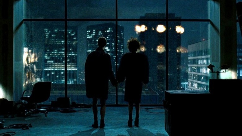 The Narrator and Marla watch as buildings explode