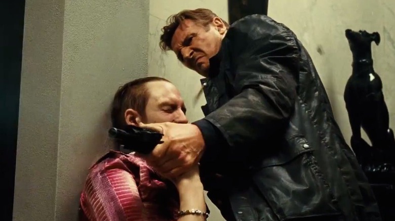 Liam Neeson with shotgun