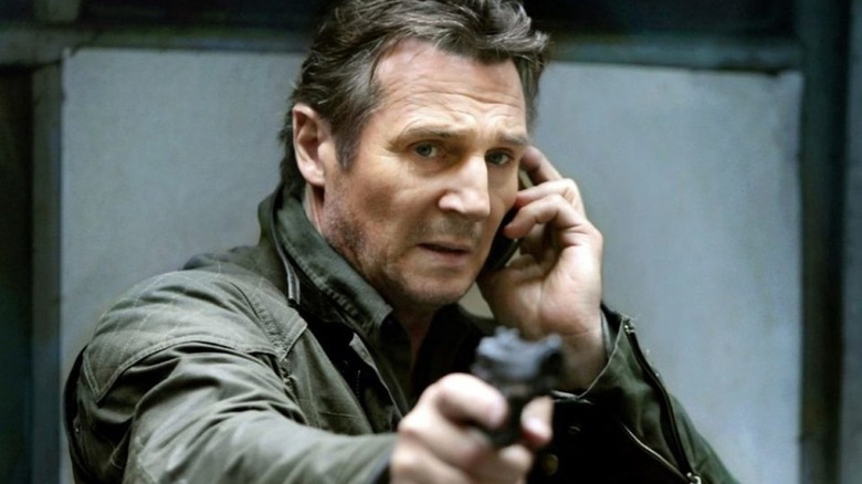 Liam Neeson with gun